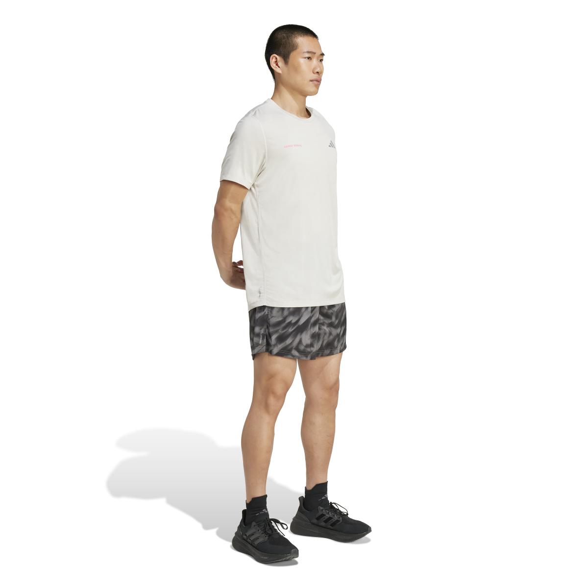 product/2/0/2025_adidas_jl8724_4_apparel_on_model_walking_view_white.jpg