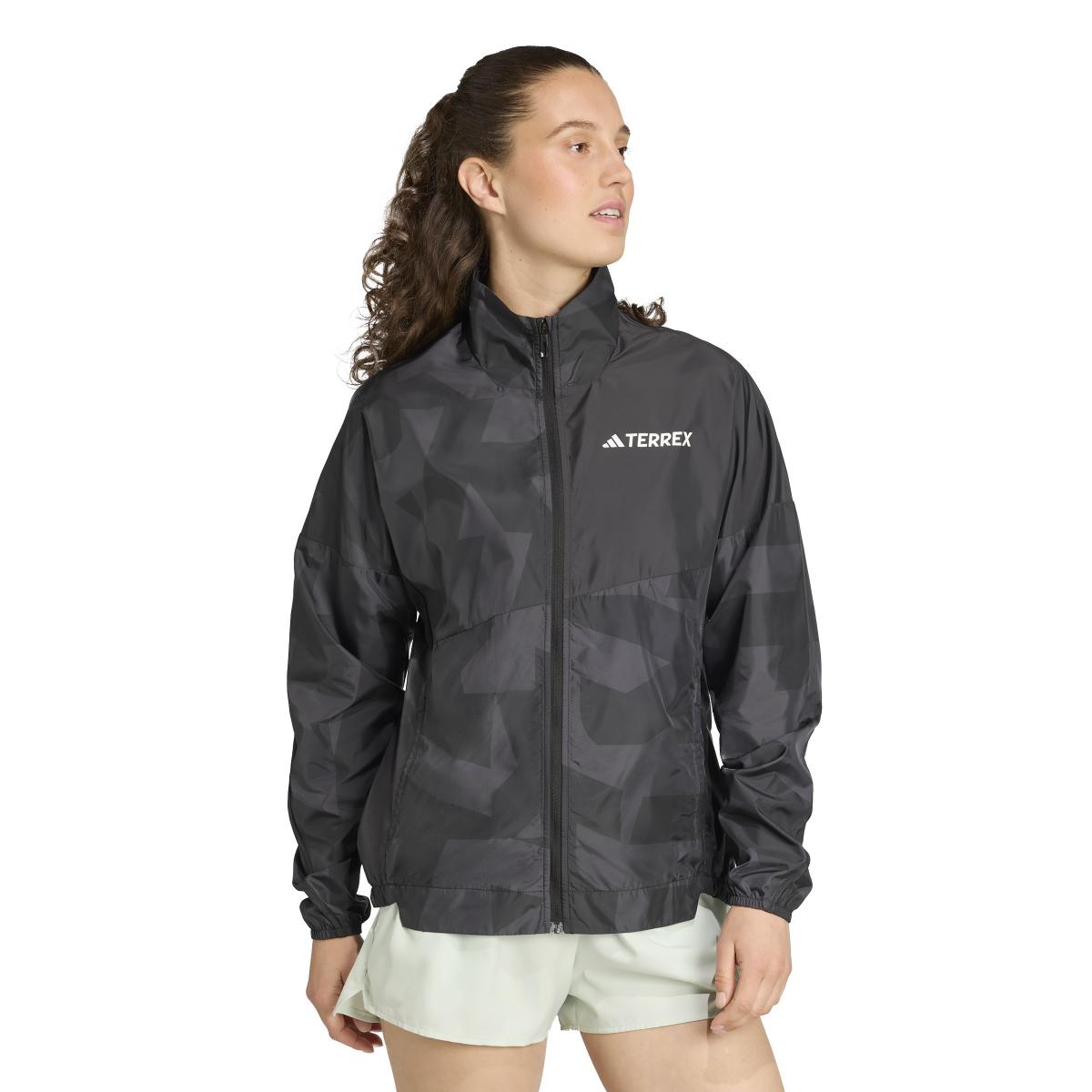 product/a/d/adidas_jd8436_4_apparel_on_model_walking_view_white.jpg