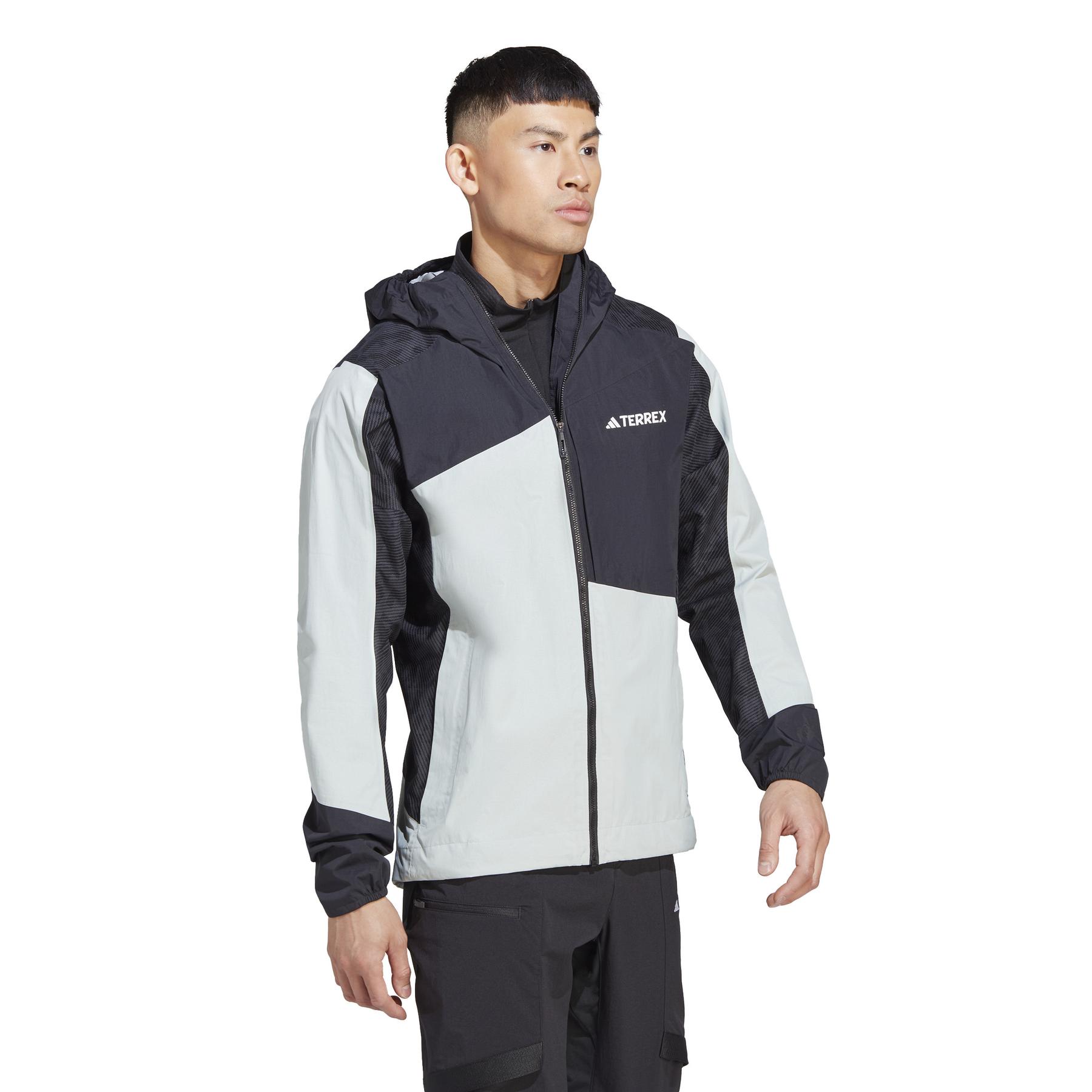 product/a/d/adidas_ib4957_6_apparel_on_model_walking_view_white.jpg