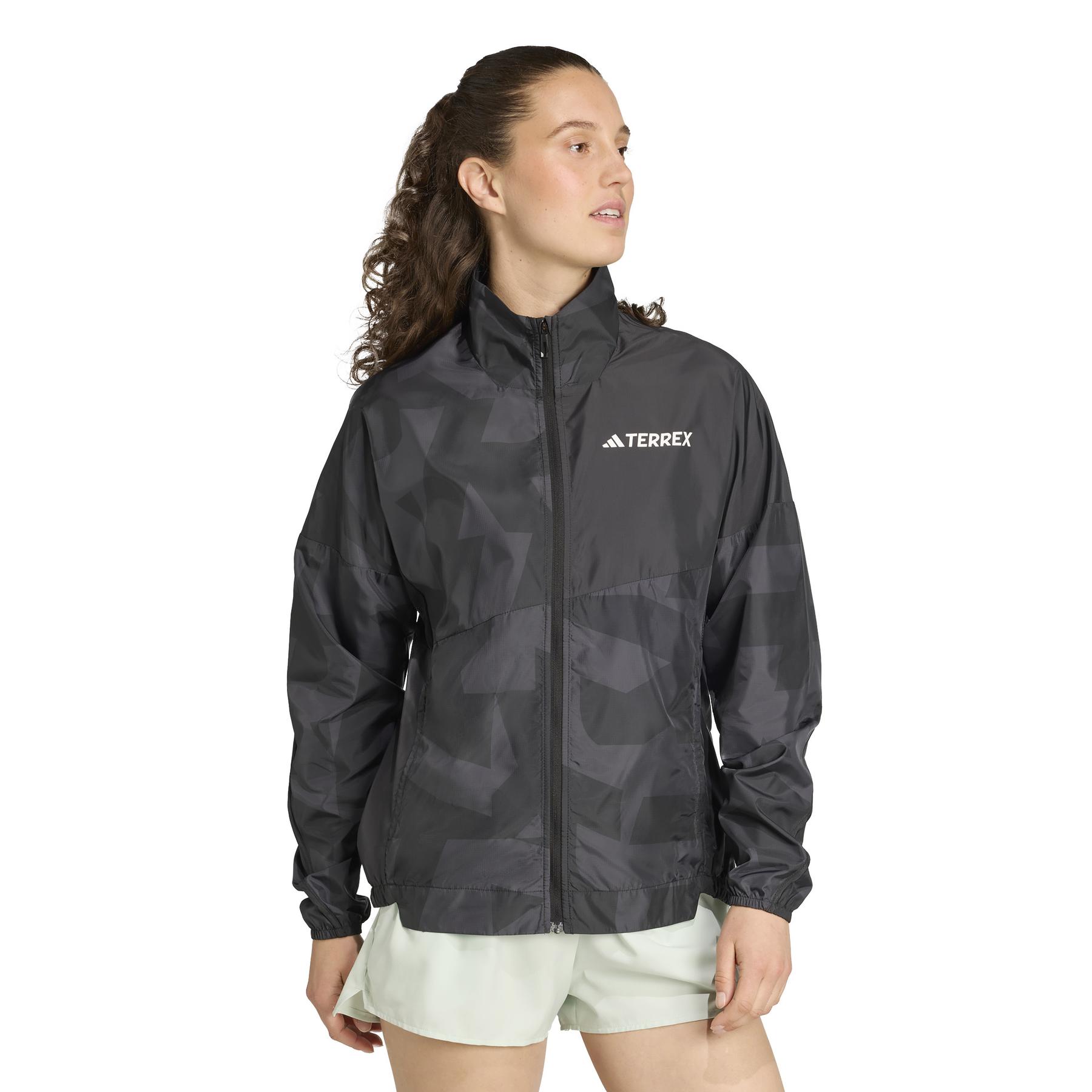 product/a/d/adidas_jd8436_4_apparel_on_model_walking_view_white.jpg