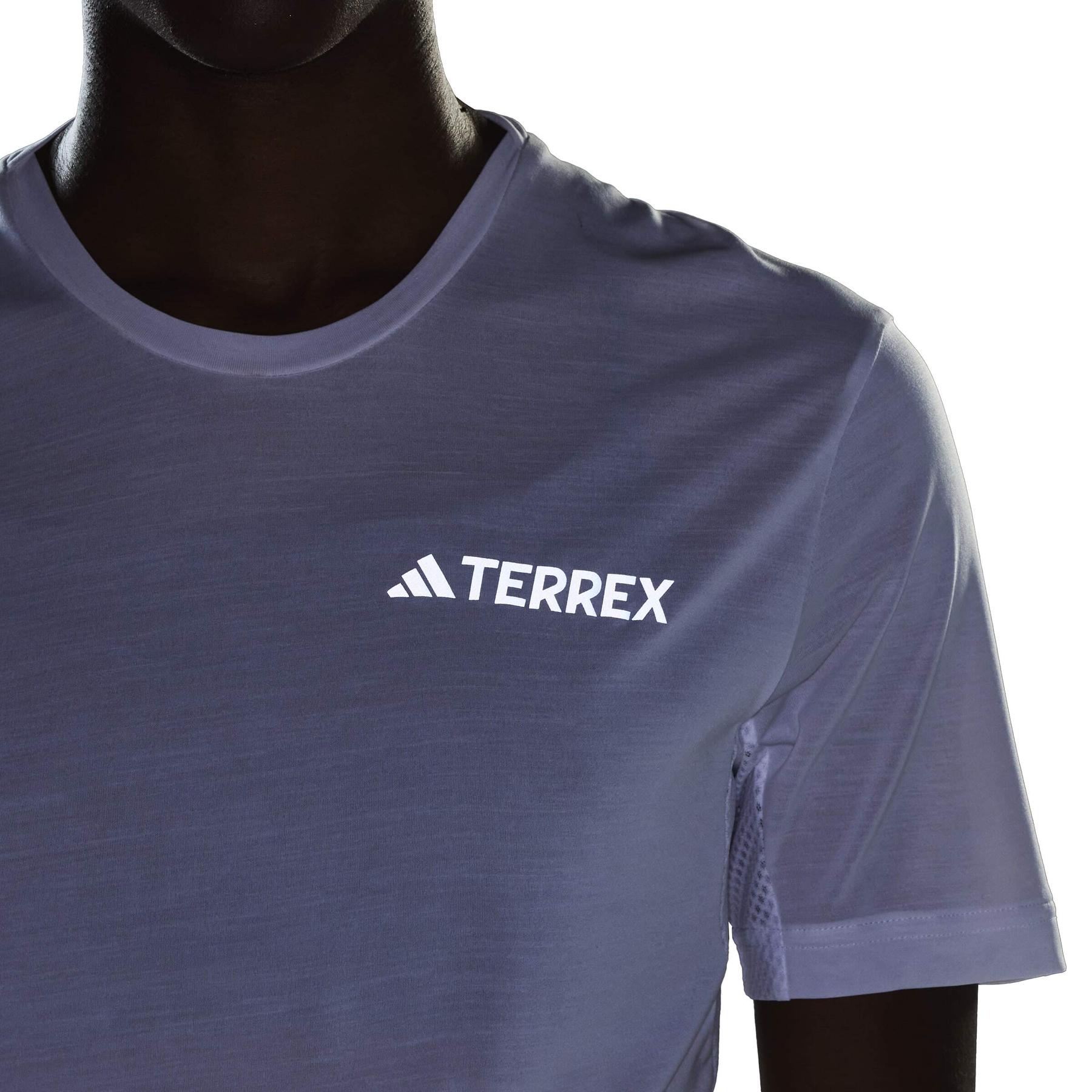 product/a/d/adidas_jn8140_8_apparel_on_model_detail_view_2_white.jpg
